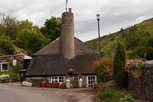 Photograph   from  the millers  dale  Derbyshire - chimmney cottage near litton mill